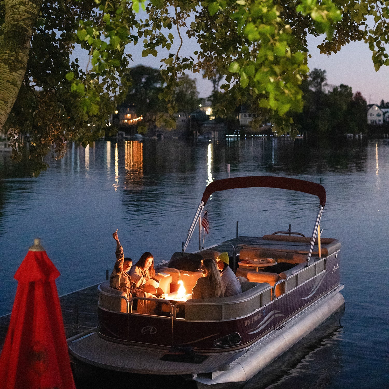 Floating Flame with Built-Ib Cooler and Cup Holders